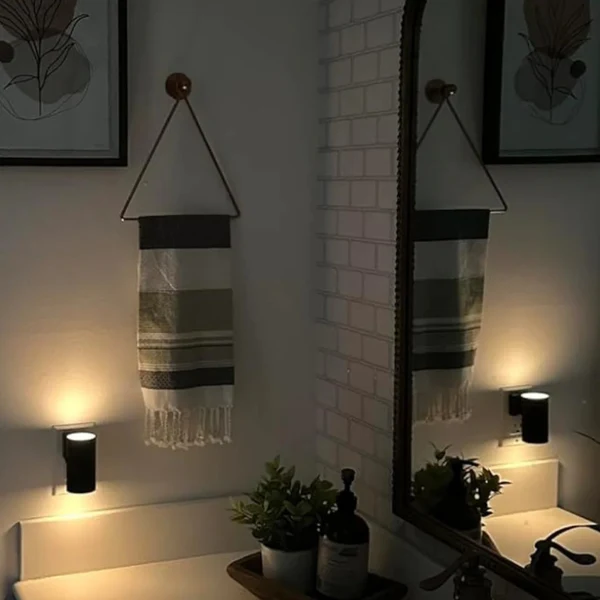 Luno warm wall light installed in a real home