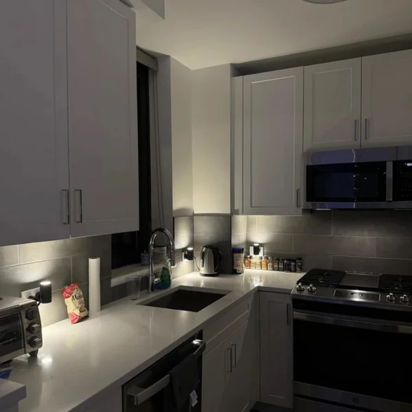 Luno warm wall light installed in a real home