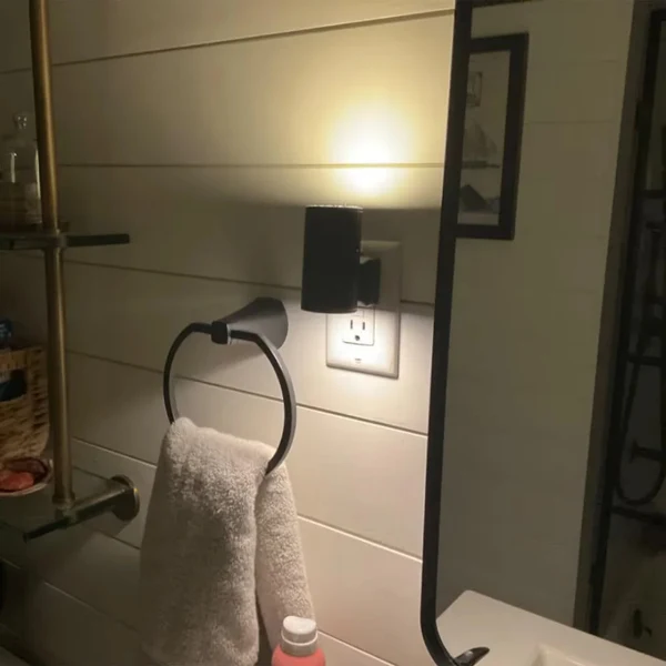 Luno warm wall light installed in a real home